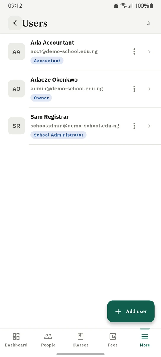 The 1410SMS Android app Users screen listing three staff accounts, each with its email address and a role chip: Ada Accountant as Accountant, Adaeze Okonkwo as Owner and Sam Registrar as School Administrator, above an Add user button